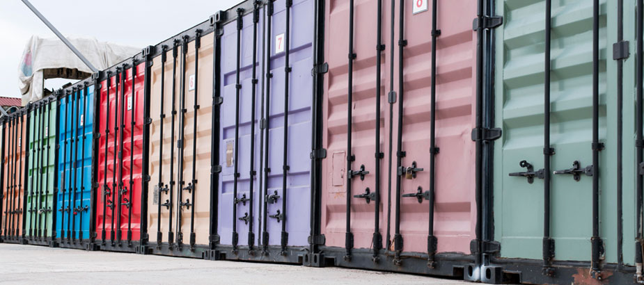 Shipping containers in a row, manage your 3PL performance with One Rail
